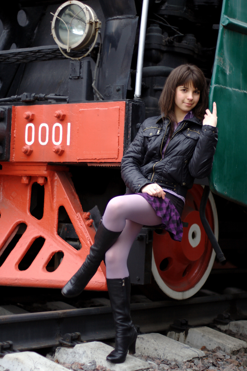 Maryana: brunette, short skirt, and trains