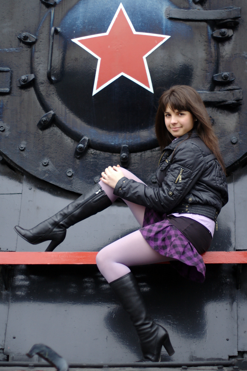 Maryana: brunette, short skirt, and trains