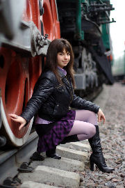 Maryana: brunette, short skirt, and trains <a href='/?p=albums&gallery=boots&image=17804055995'>☰</a>