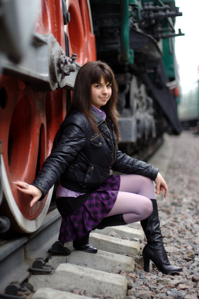 Maryana: brunette, short skirt, and trains